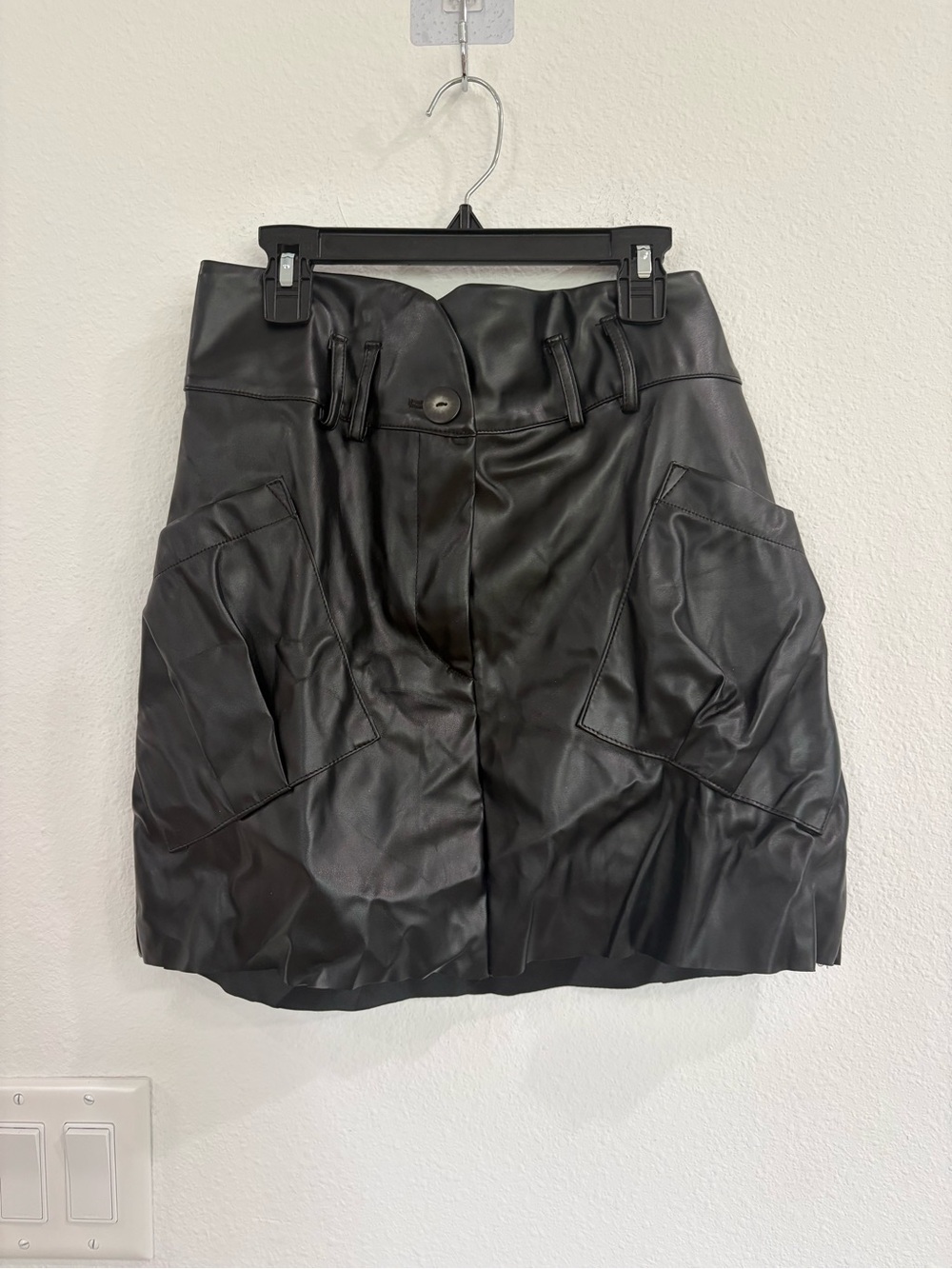Stillwater NWT black faux leather cargo mini skirt.
